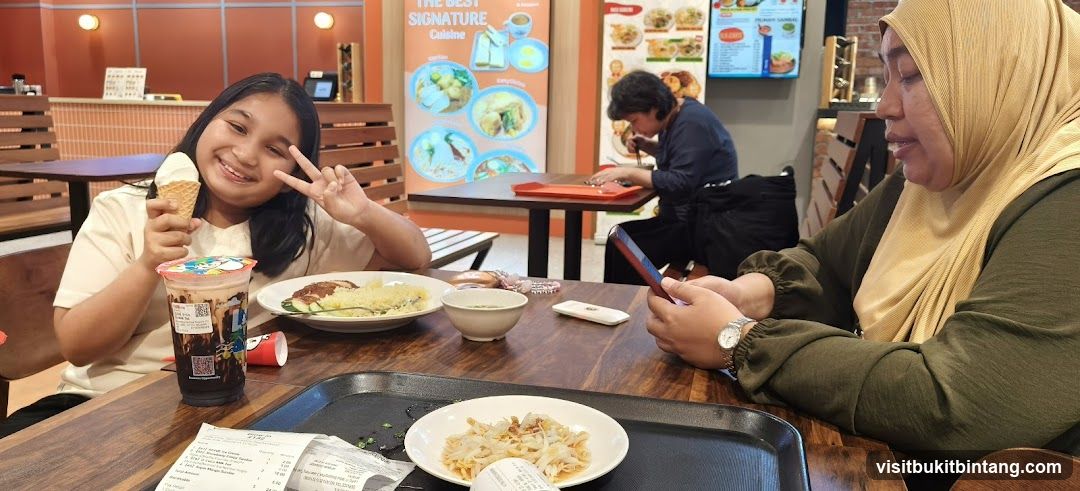 People eating at a food court
