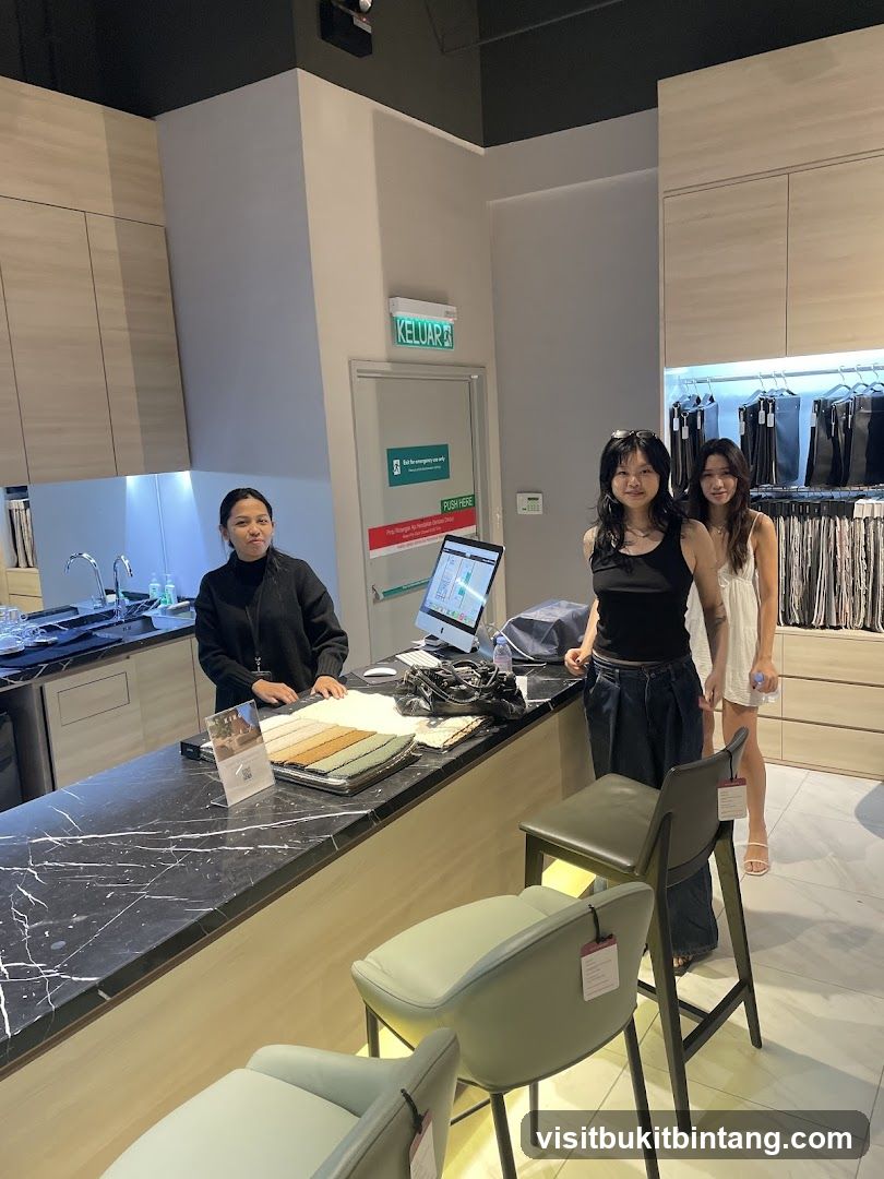 Interior of a store with staff and customers