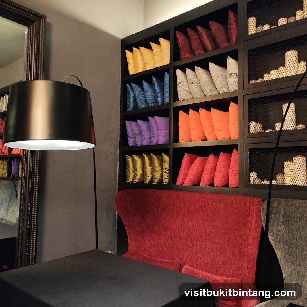 Interior seating area with decorative pillows and candles