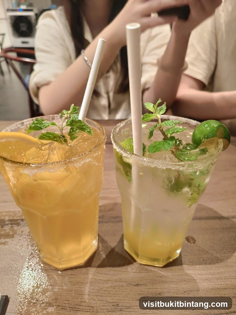 Two refreshing drinks on a wooden table