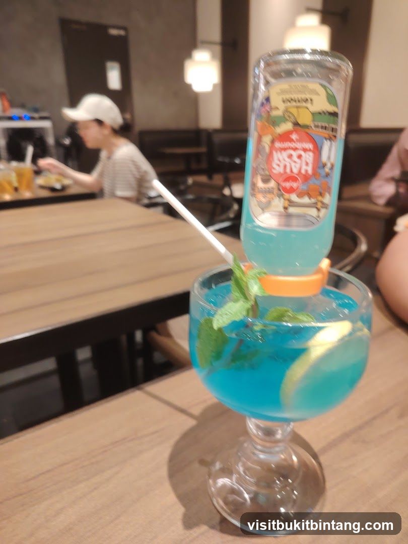 Blue Cocktail with Bottle Garnish