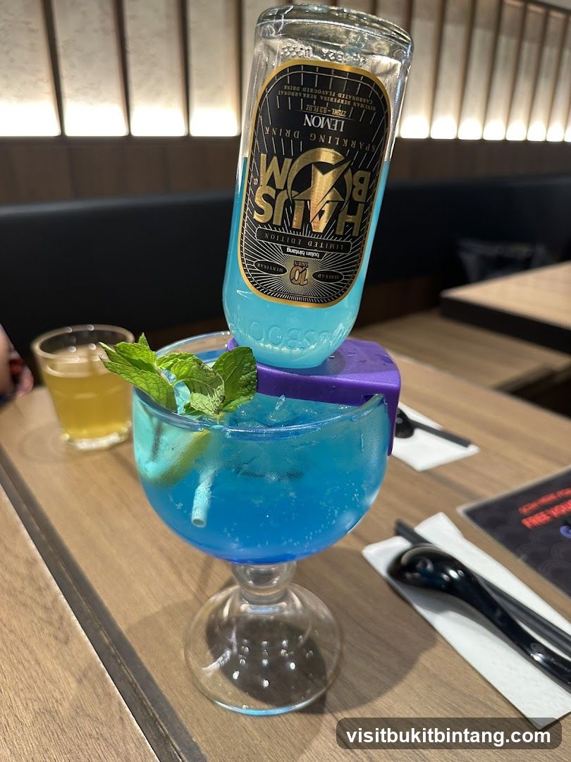 Blue Cocktail with Sparkling Drink Bottle
