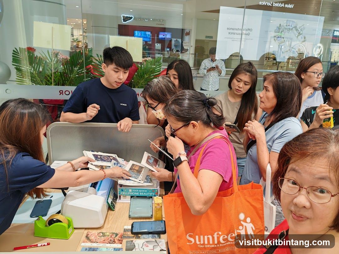 People looking at promotional materials