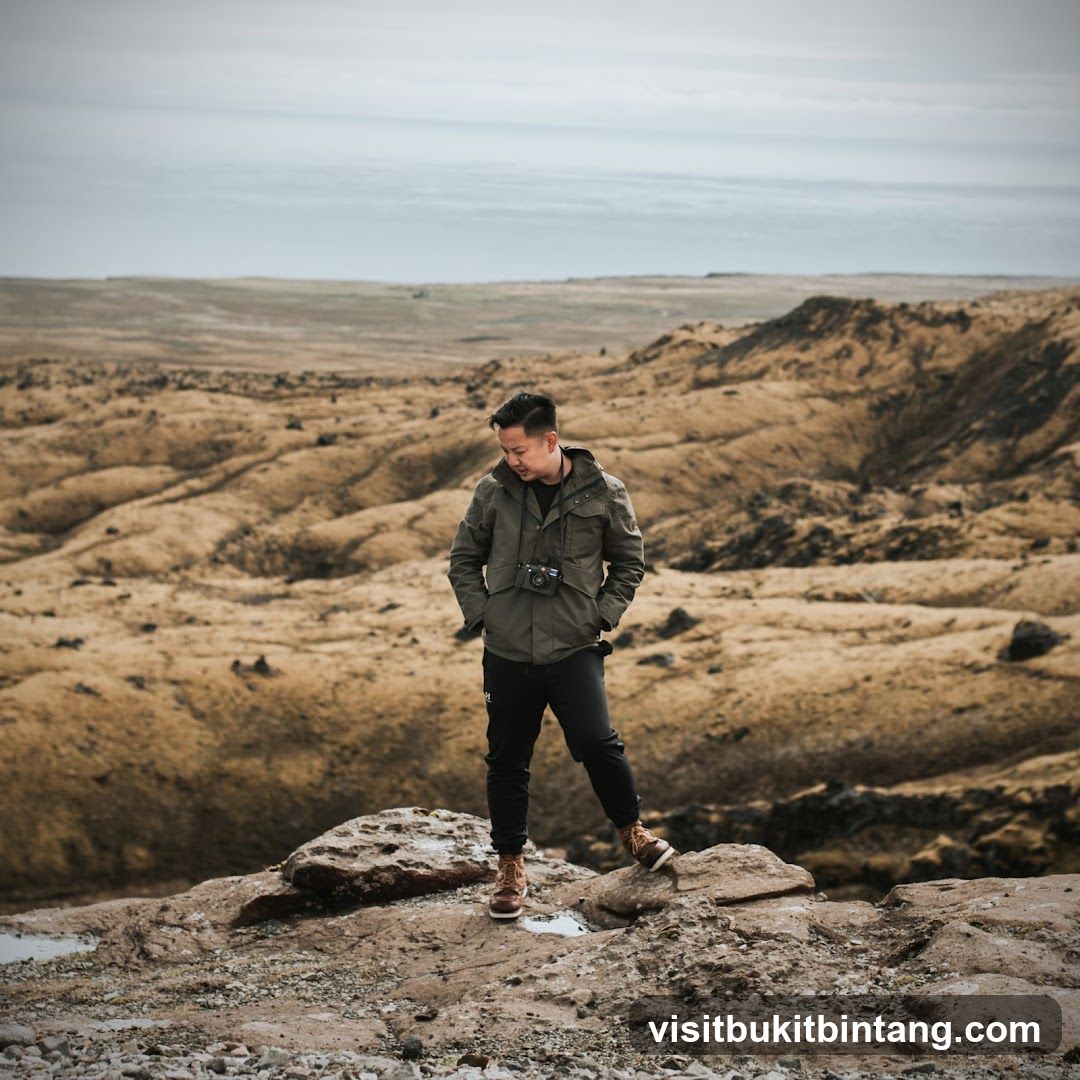 Man standing on rocky terrain