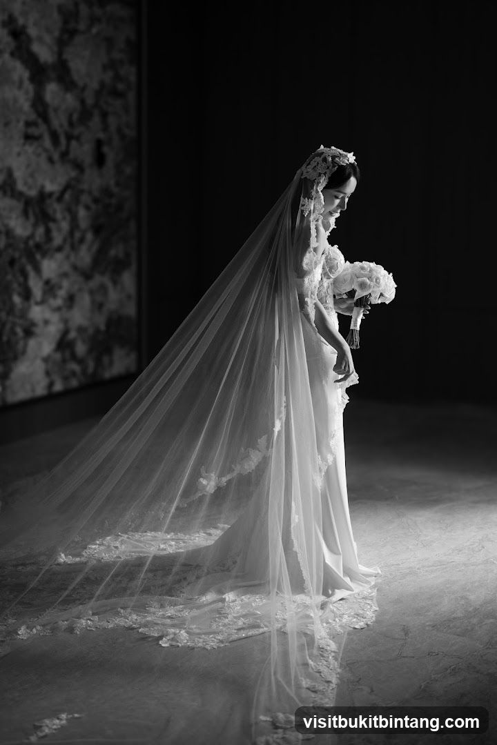 Bride in Veil Holding Bouquet