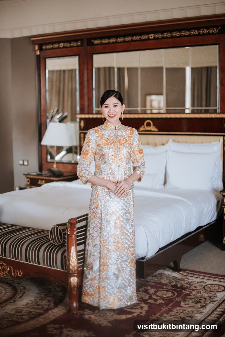 Woman in Traditional Chinese Dress in a Hotel Room