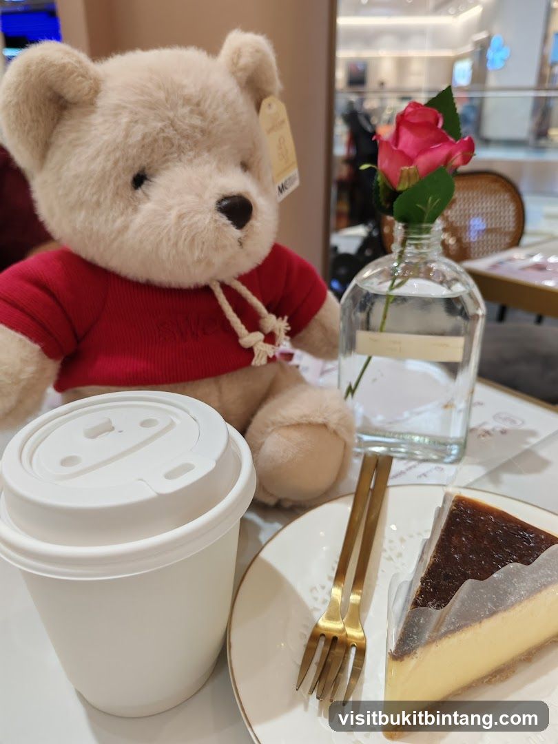Teddy bear with coffee and cheesecake