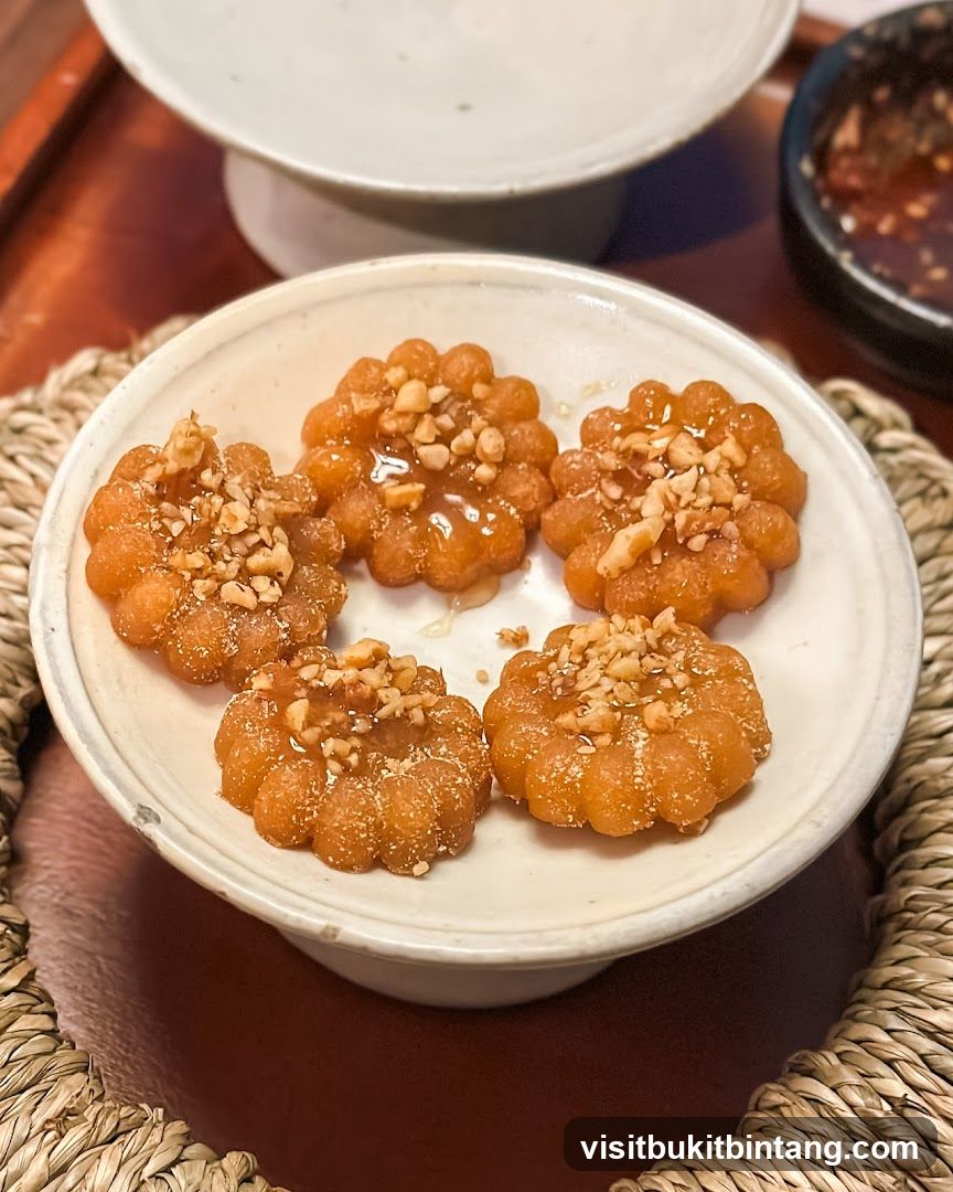 Flower-shaped cookies with nuts and syrup