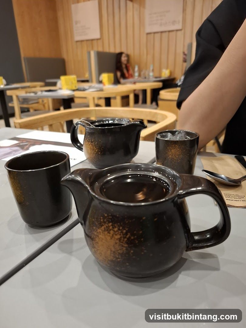 Table Setting with Teapot and Cups