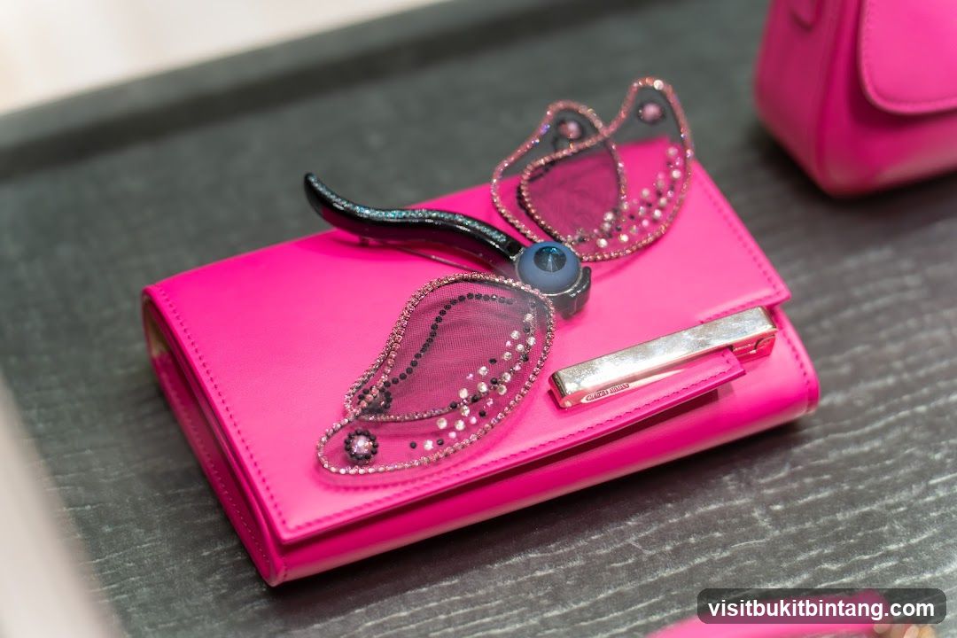 Pink Clutch with Butterfly Embellishment