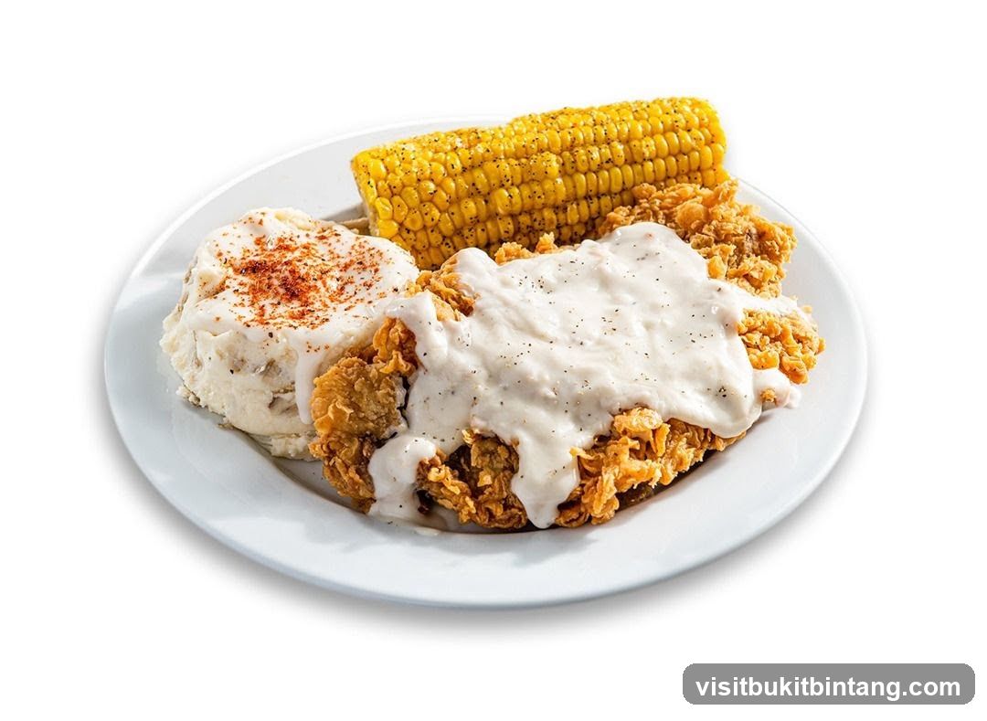 Fried Chicken with Mashed Potatoes and Corn
