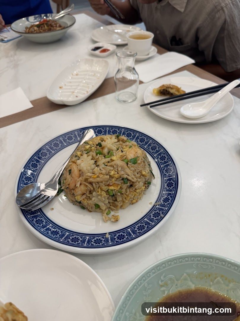 Table with Fried Rice and Other Dishes