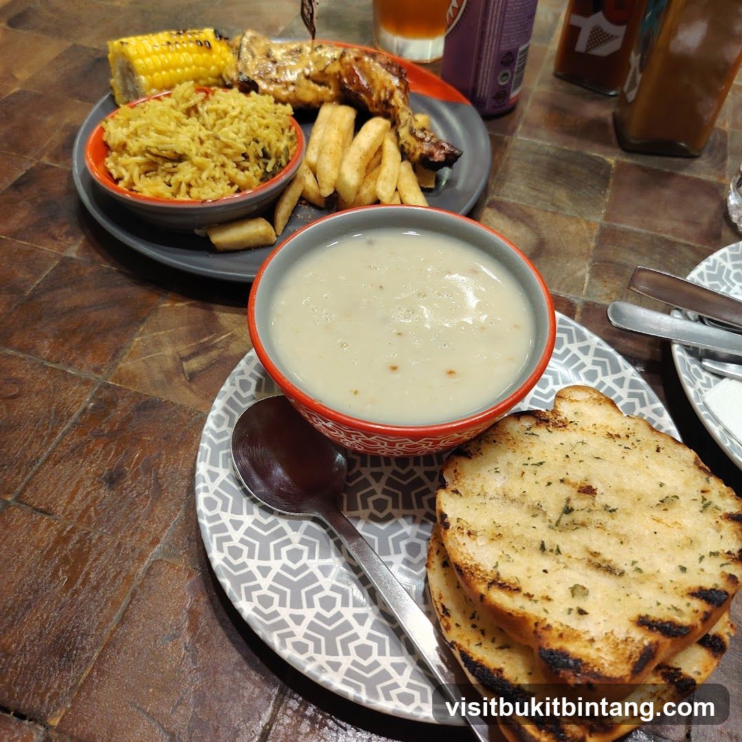 Meal with Soup and Garlic Bread