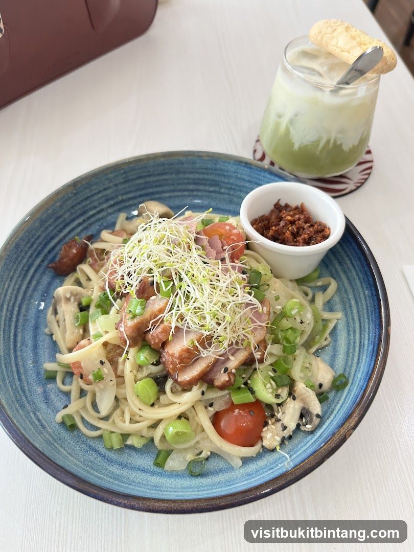 Noodle Dish and Matcha Drink