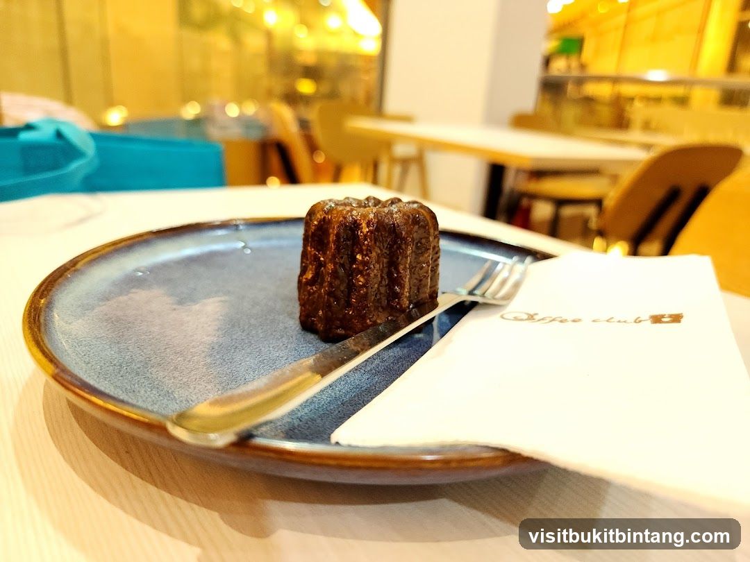 Canelé Pastry with Coffee Club Napkin