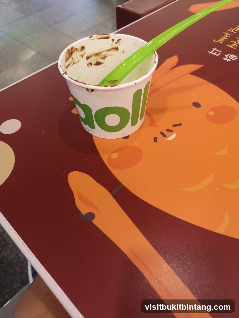 Dessert Cup with Spoon on Table