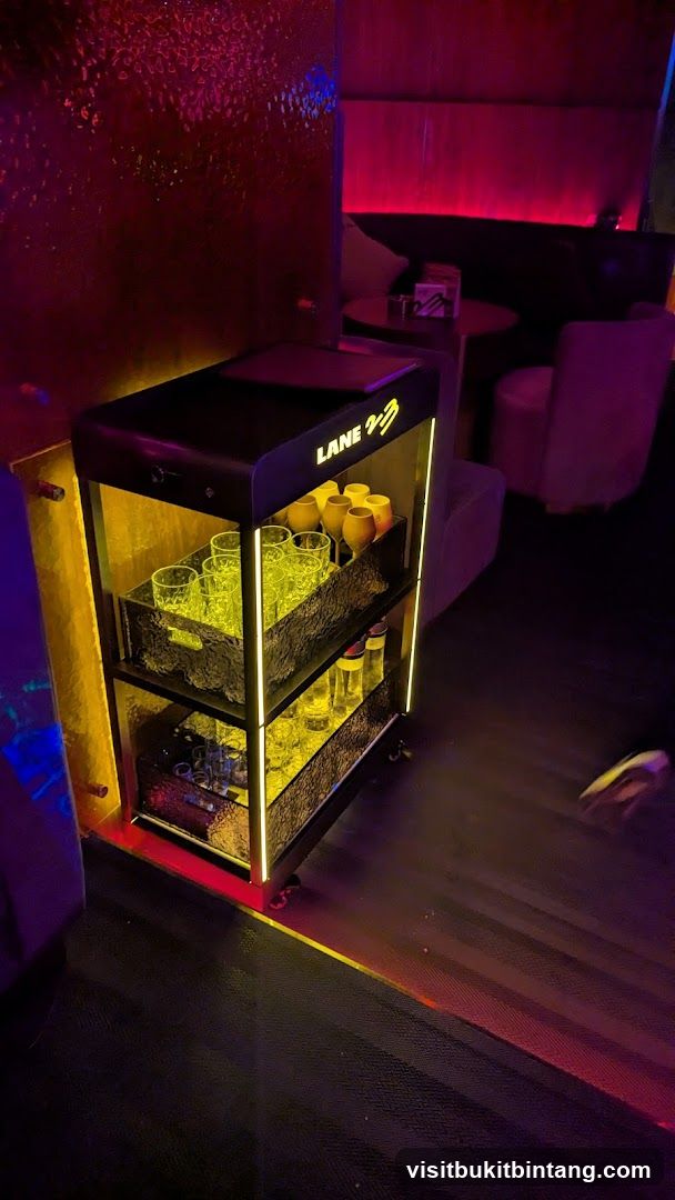 Bar Cart with Glasses and Bottles