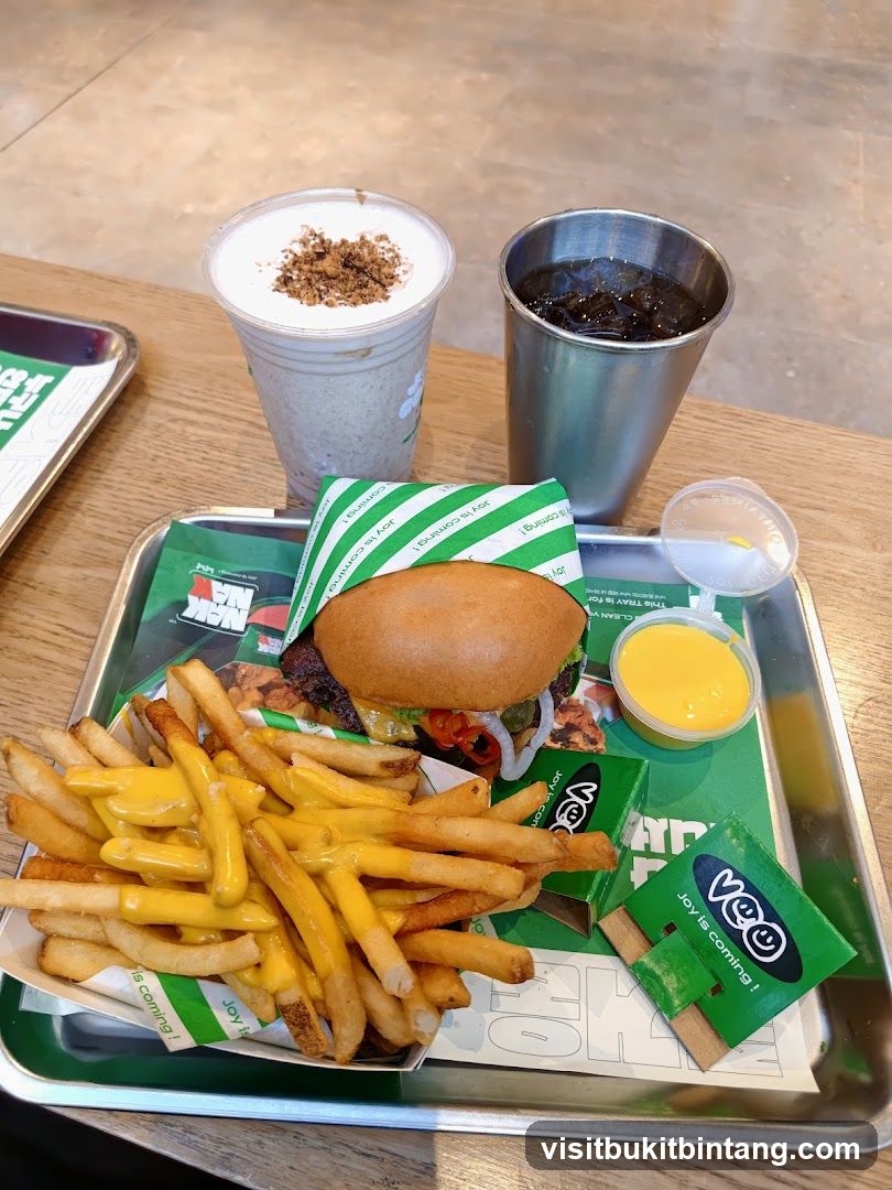 Burger meal with fries and drinks