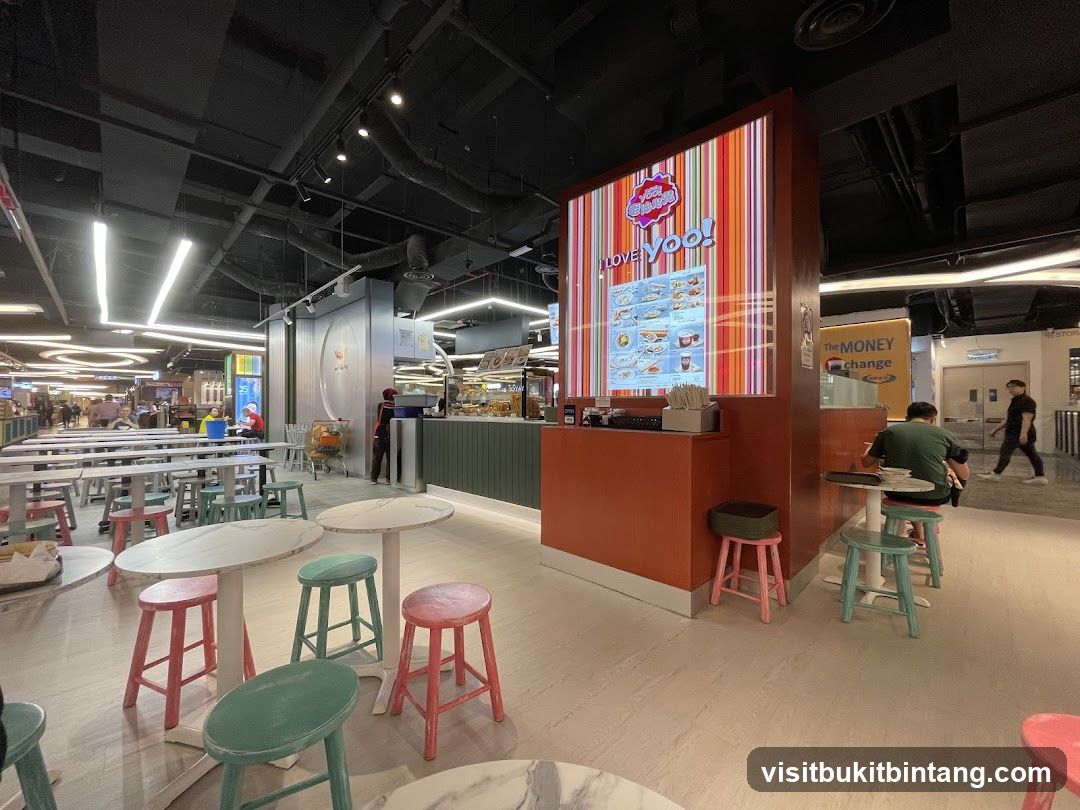 Food stall with digital menu and seating area