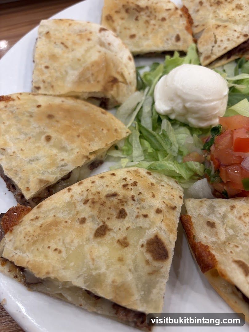 Quesadillas with Salad and Sour Cream