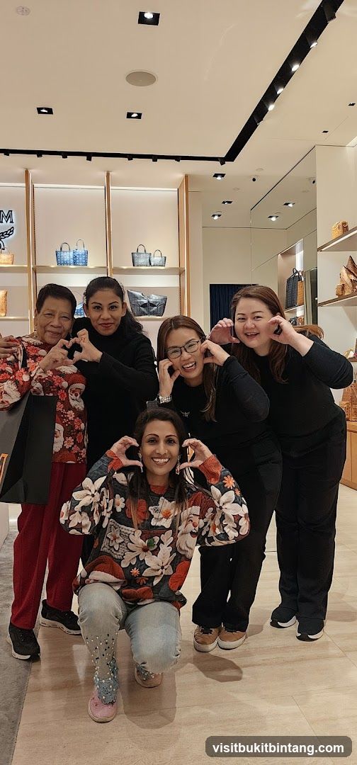 Group of women making heart shapes with their hands