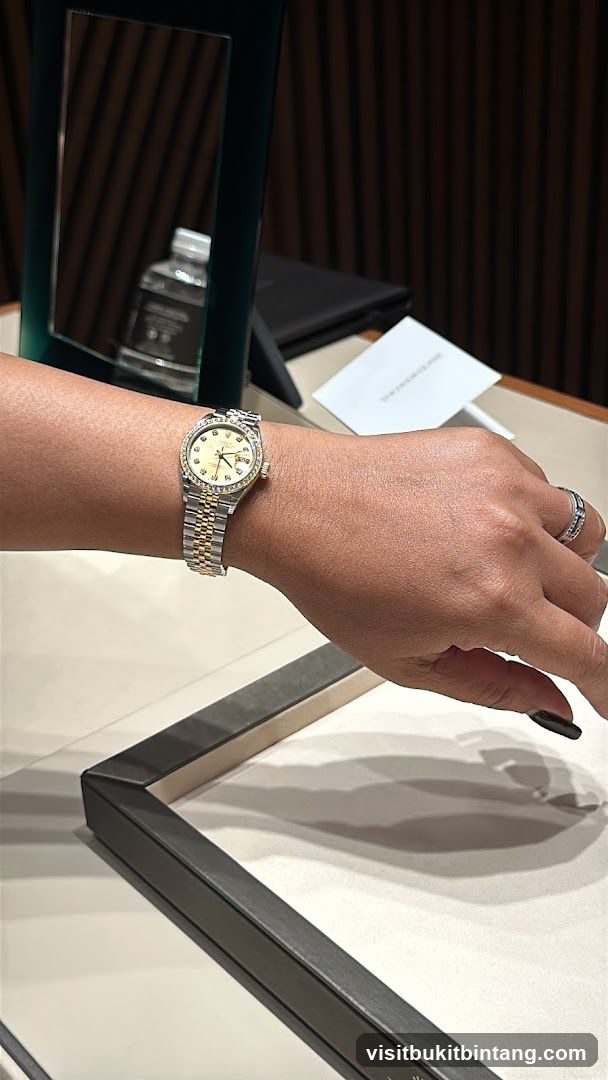 Woman's Wrist with Rolex Watch