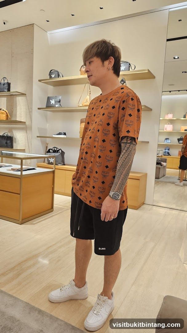 Man in MCM Shirt in Store