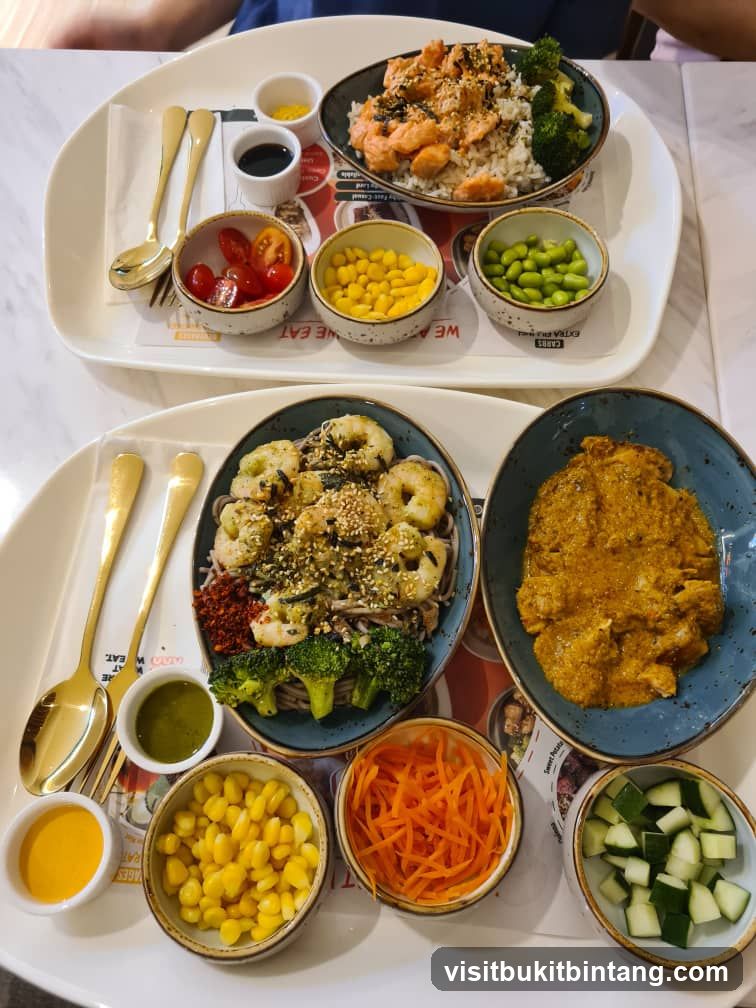 Two bowls of food with side dishes