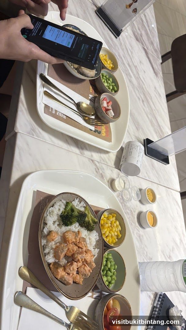 Two meals with sides and sauces