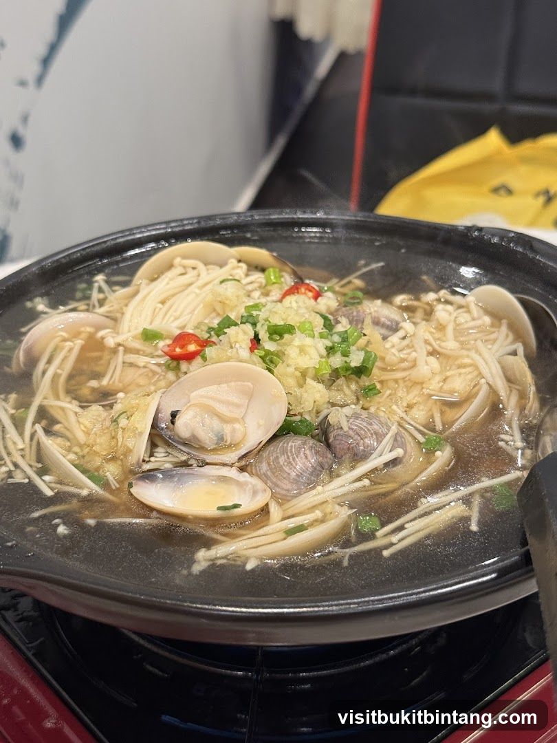 Steaming Pot of Clams and Enoki Mushrooms