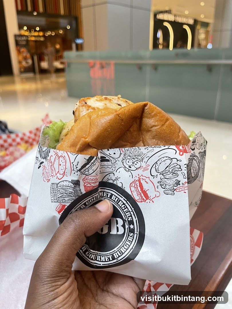 Burger in branded wrapper
