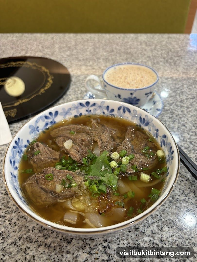 Beef noodle soup and coffee