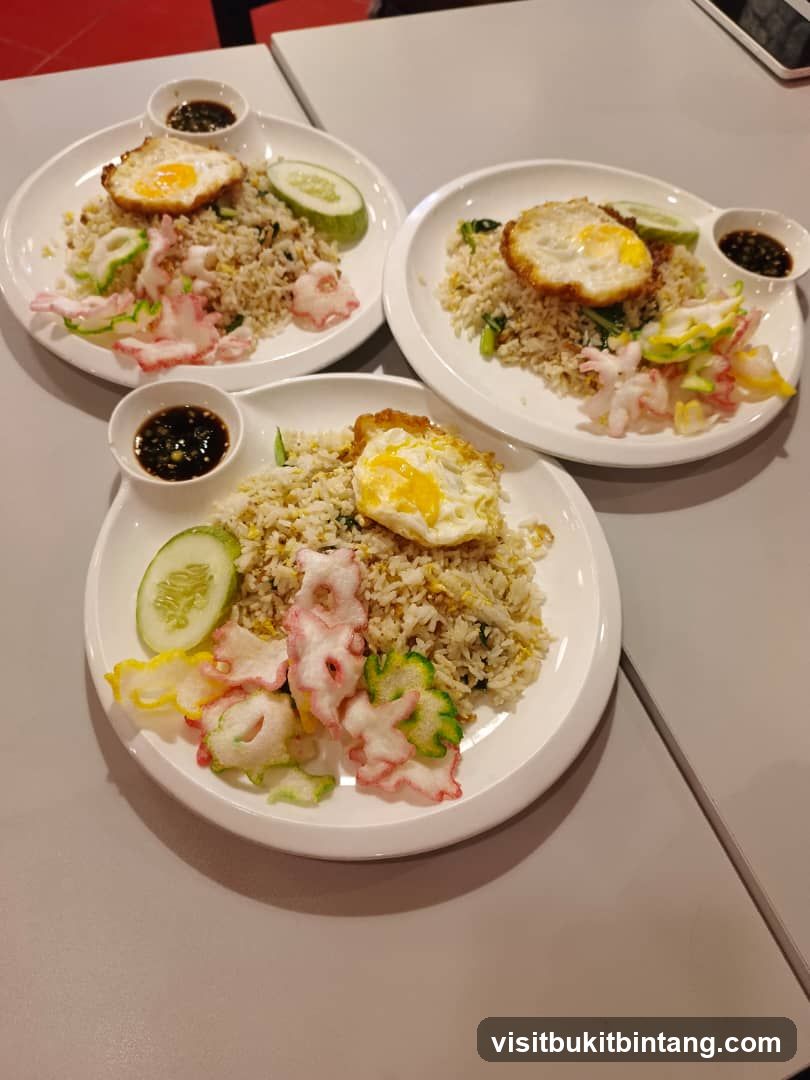Three plates of fried rice