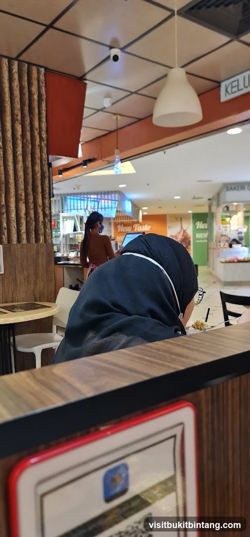 Diners at a Food Stall