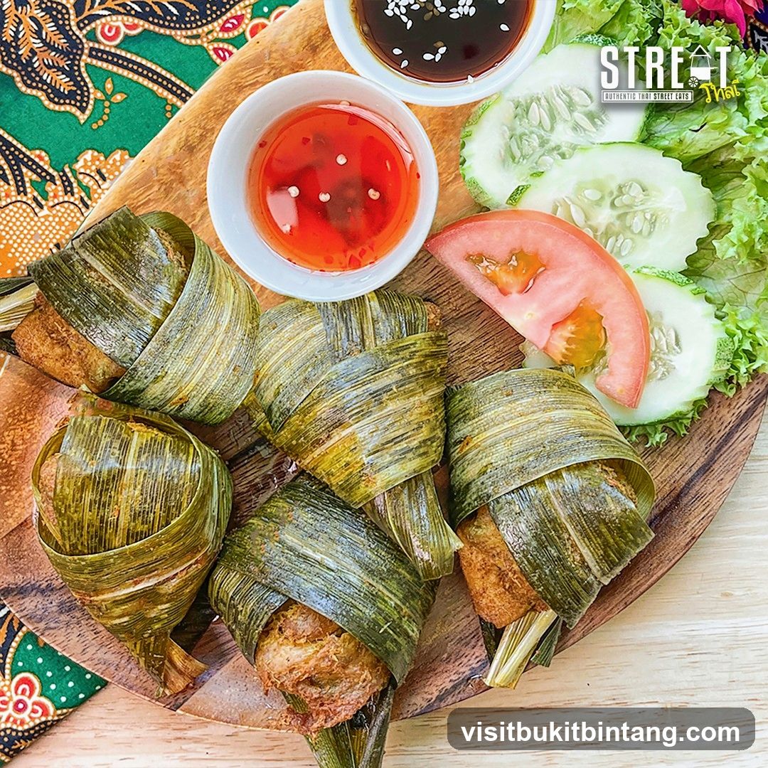 Chicken wrapped in pandan leaves