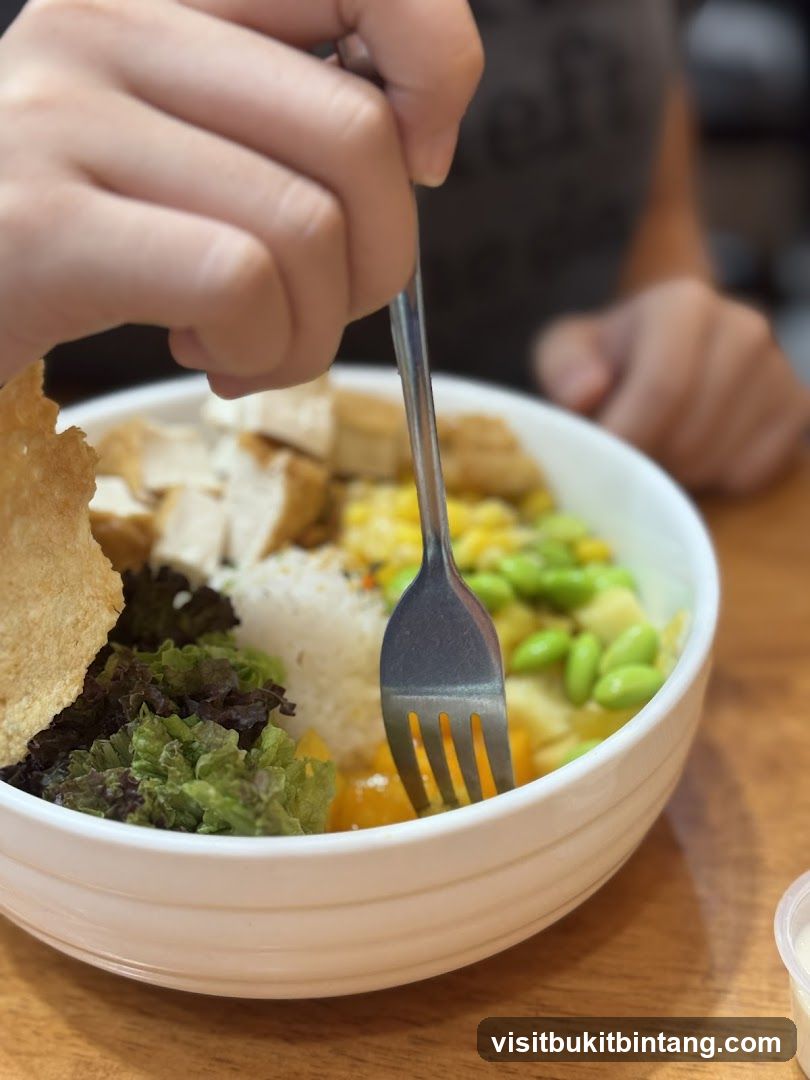 Close-up of a poke bowl with a fork