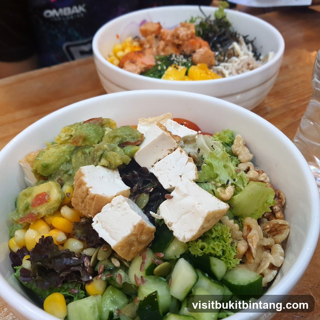 Two bowls of poke bowls