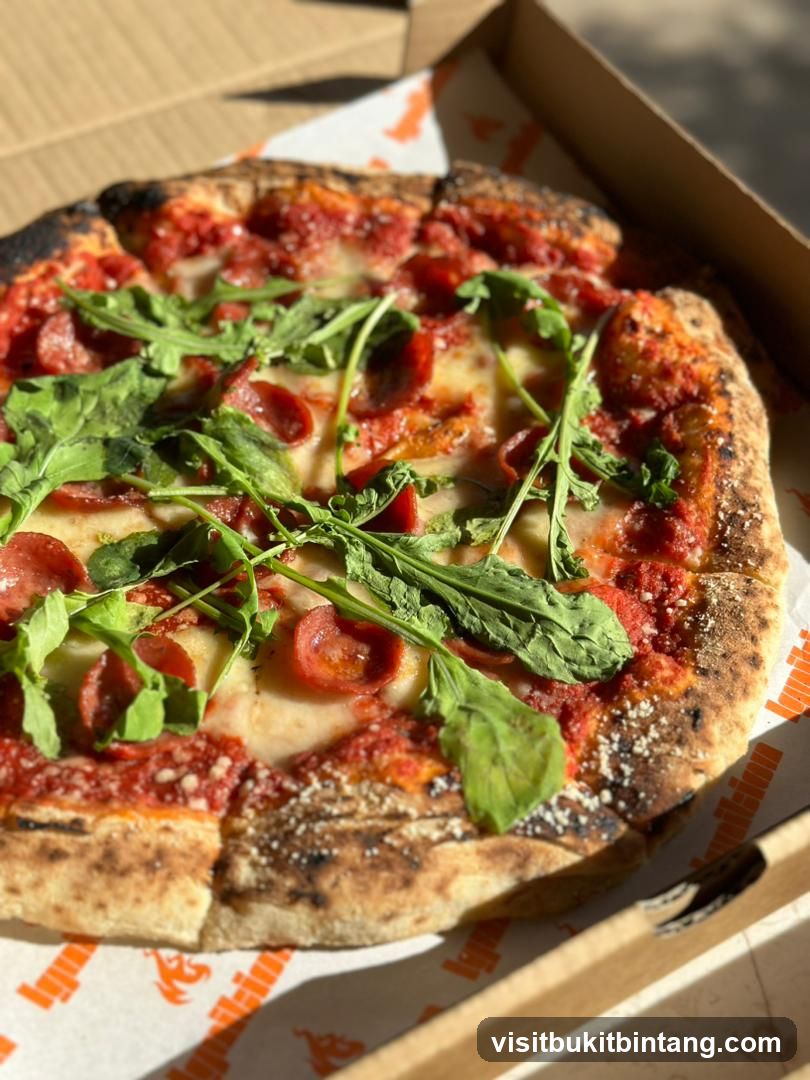 Pepperoni and Arugula Pizza