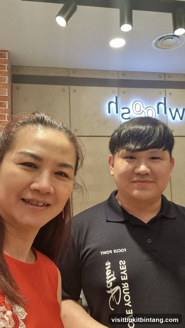 Two people posing for a photo