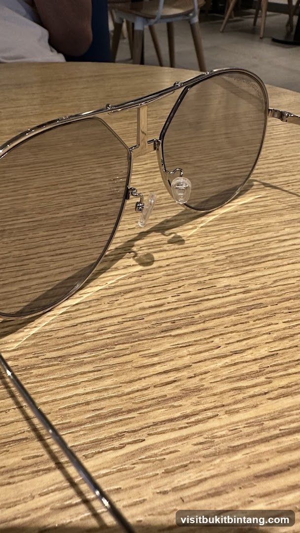 Aviator Sunglasses on Wooden Table