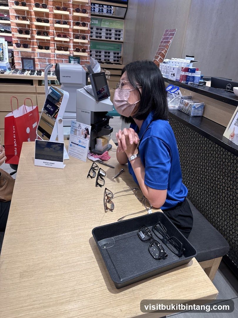 Optician assisting customer