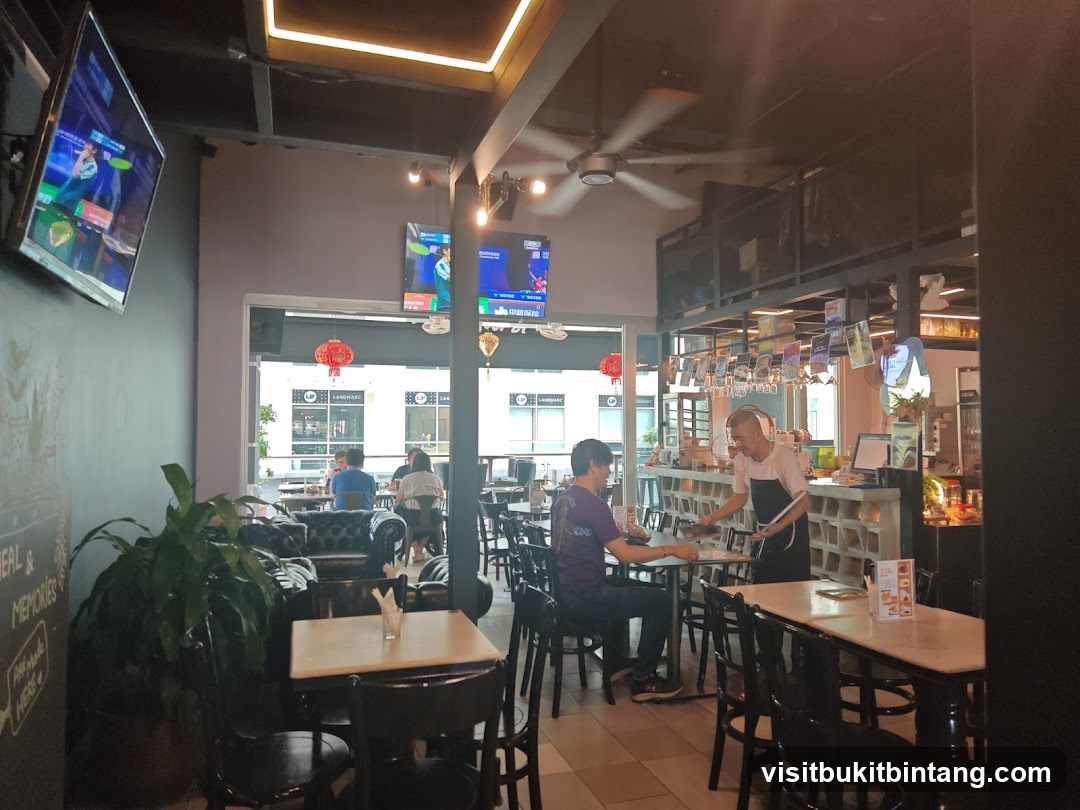 Restaurant Interior with TVs and Seating