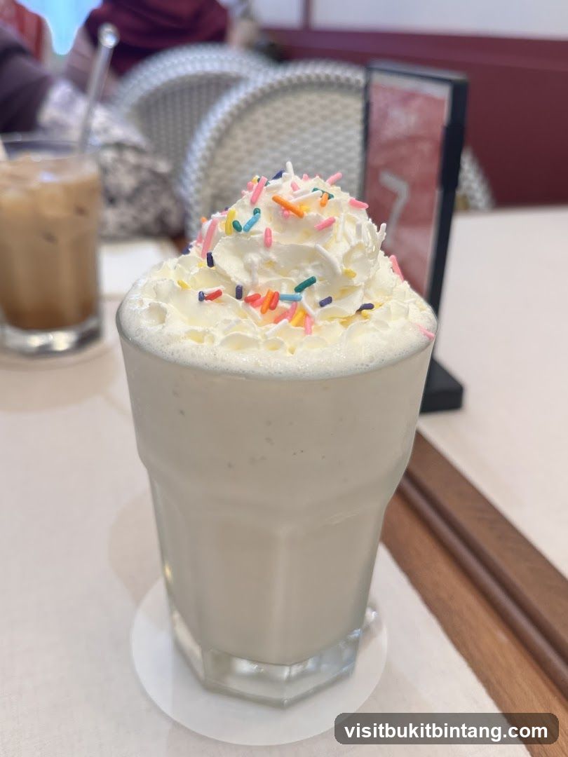 Whipped Cream Topped Drink with Sprinkles