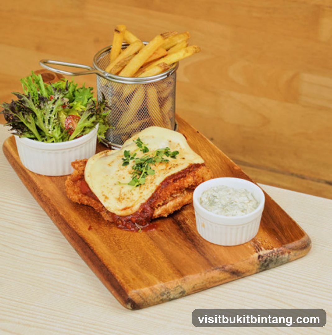Chicken Parmigiana with Fries and Salad
