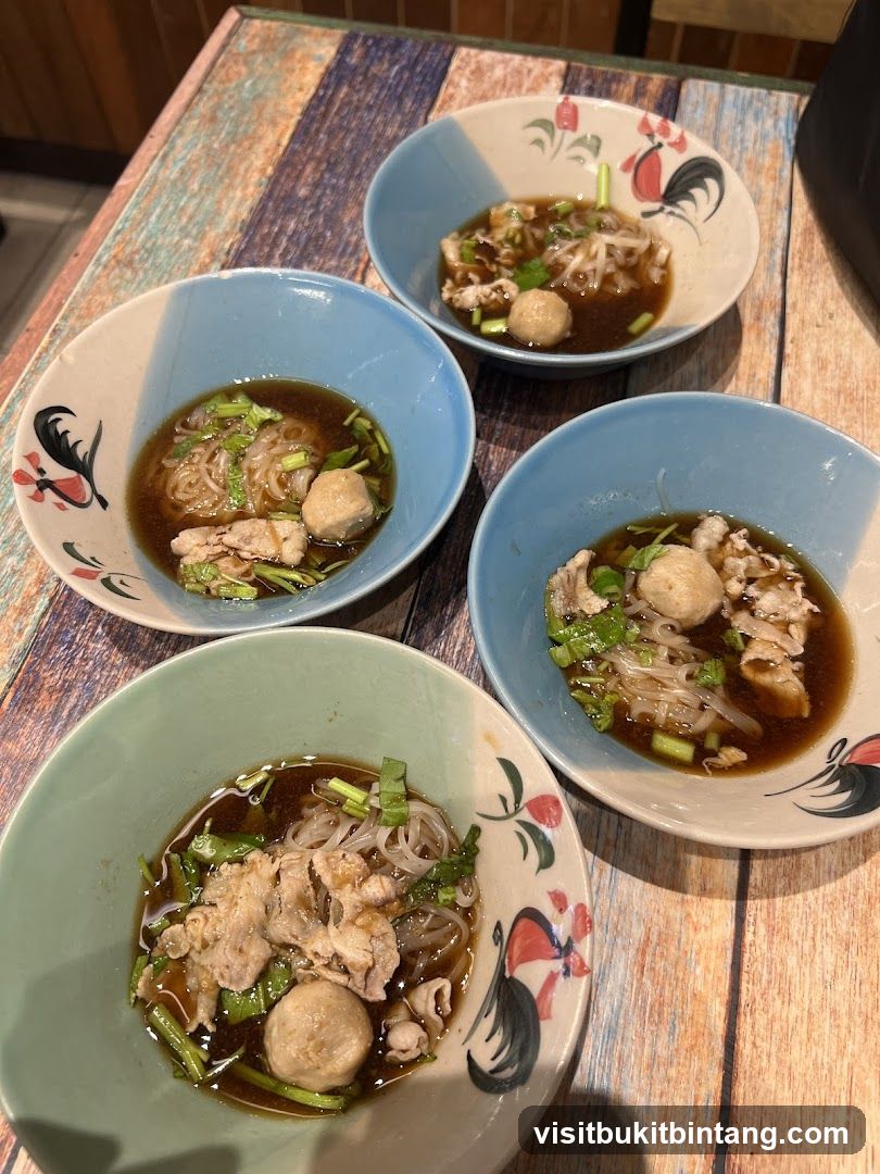 Four bowls of noodle soup