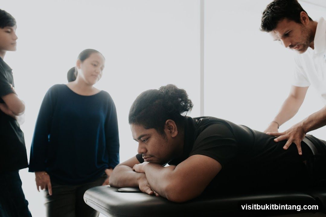 Therapist Massaging Patient