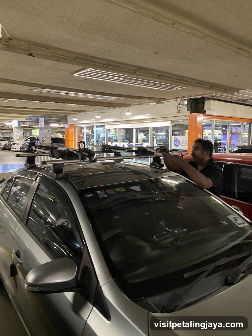 Car with roof rack in parking garage