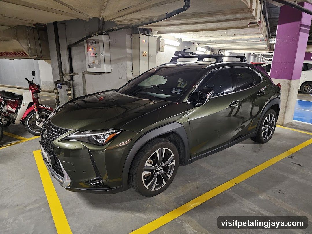 Green SUV in Parking Garage
