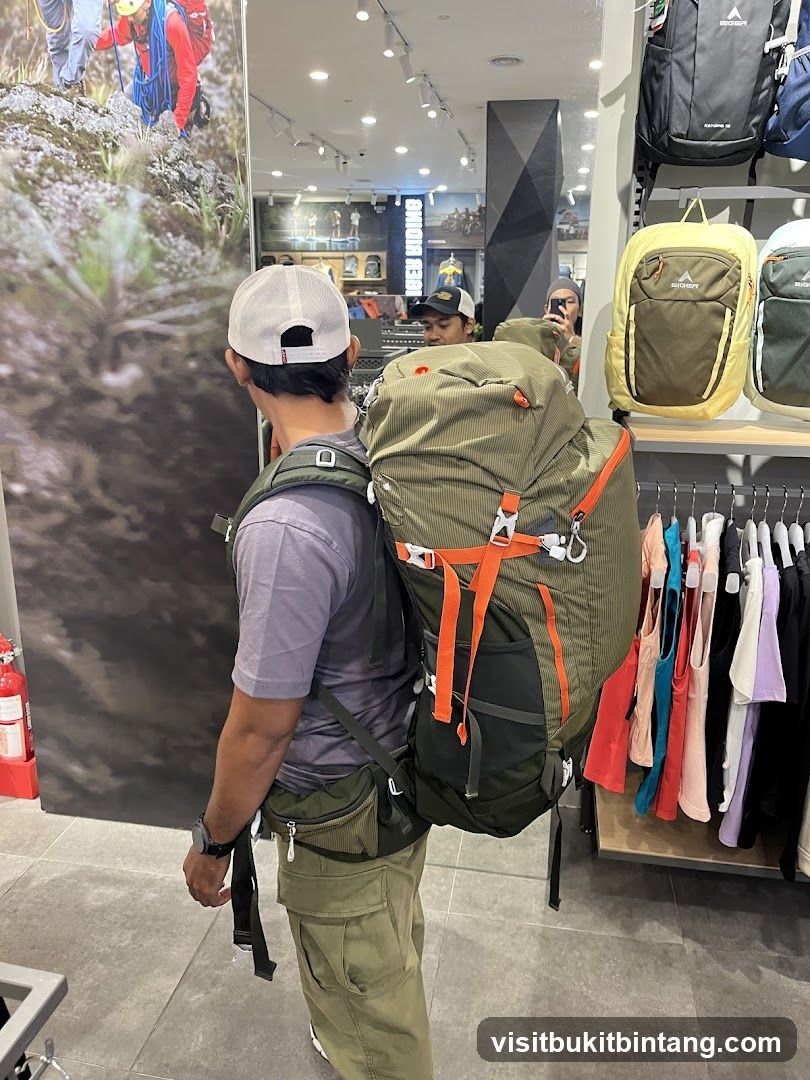 Man trying on a large backpack