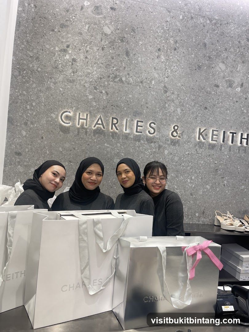 Staff Posing with Shopping Bags